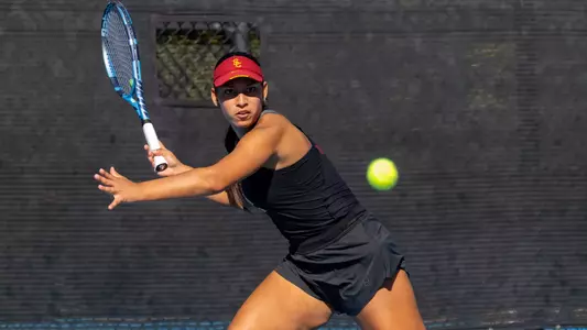 Dani Borruel hits a tennis ball