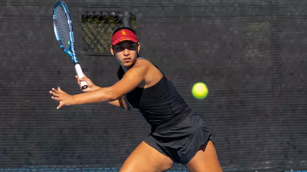 Dani Borruel hits a tennis ball