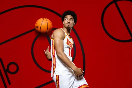 Rodney Rice passes the ball behind his back during Media Day