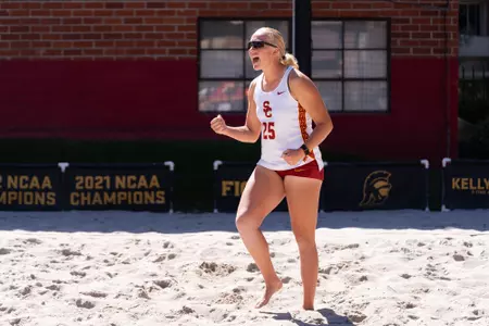 Kaileigh Truslow cheers after winning a point