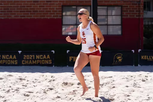 Kaileigh Truslow cheers after winning a point