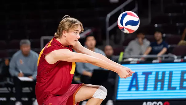 USC men's volleyball libero Johnny Dykstra digs a ball at Galen Center