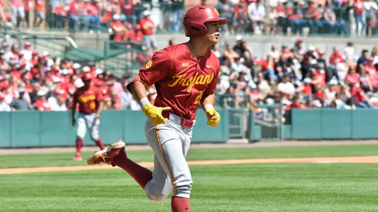 Augie Lopez rounds the bases after hitting a home run against Nebraska.