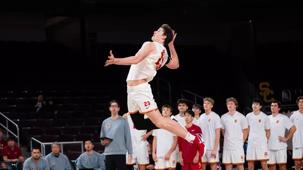 USC men's volleyball opposite hitter Cooper Keane goes up to hit the ball during a match at Galen Center
