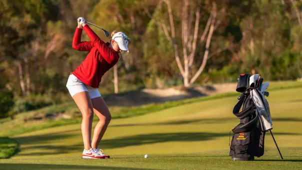 Bailey Shoemaker swings an iron at the GameAbove Invitational