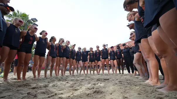 USC Beach Volleyball huddles up after a dual