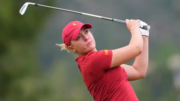 Bailey Shoemaker swings an iron during the Big Ten Championships
