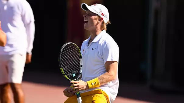 Max exited celebrates with a scream on the tennis court