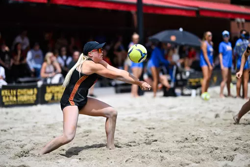 Ashley Pater digs a ball up against UCLA