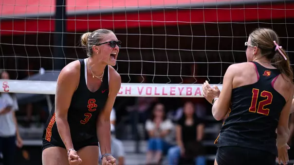 Kennedy Coakley and Zoey Henson celebrate after a point