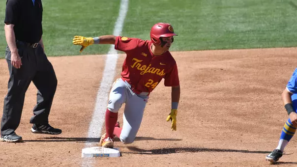 Augie Lopez advancing to third base during second game against UCLA