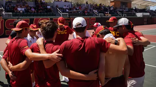 USC men's tennis huddles pre match