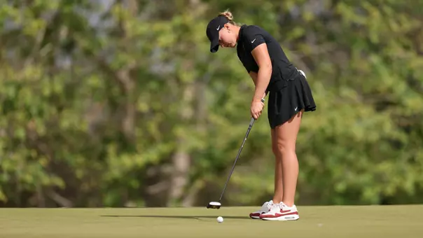 Bailey Shoemaker putts at the GameAbove Invitational
