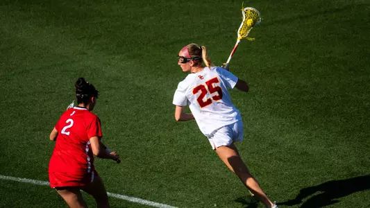 USC lacrosse midfielder Casey Roberts carries the ball during a game against Rutgers at Rawlinson Stadium
