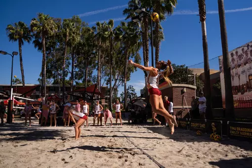 Kennedy Coakley serves a ball against Cal Poly
