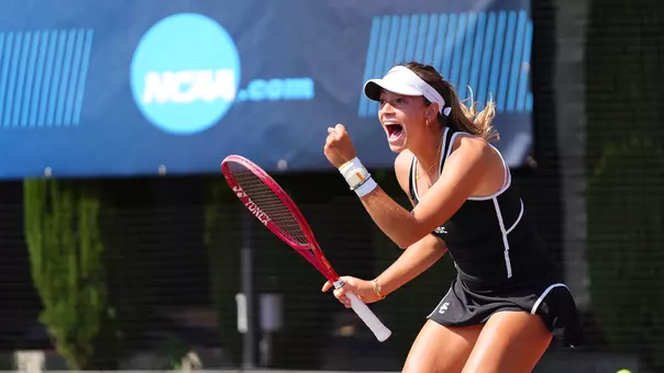Immi Haddad celebrates winning a point with a fist pump