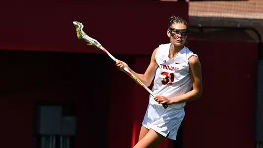 USC lacrosse defender Sophie Gangemi looks to pass the ball during a game against Michigan at Rawlinson Stadium