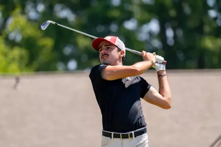 Antonio Safa swings an iron at the NCAA Winston-Salem Regional