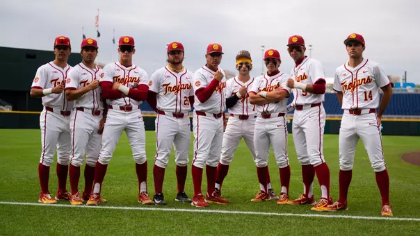 Trojans pose on the field in Omaha at Charles Schwab Field before the Big Ten Tournament.