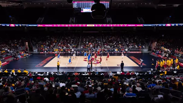 USC men's volleyball on the court at Galen Center in a match against UCLA