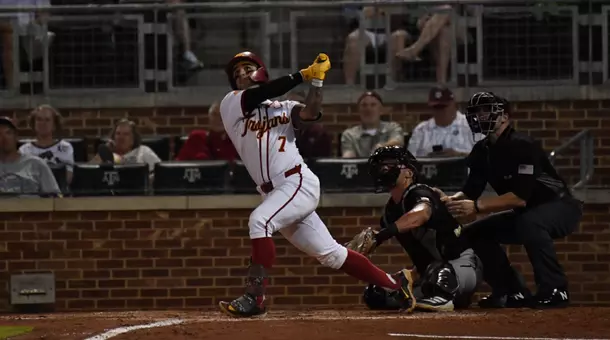 Abbrie Covarrubias hits a home run to give the Trojans the lead in the NCAA Baseball Regionals