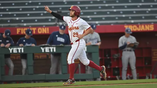 Andrew Lamb jogs towards home plate after hitting a home run against Nevada.