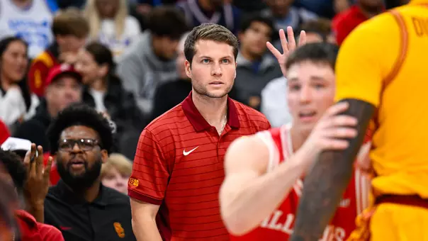 Michael Musselman watches from the bench during USC men's basketball's game against Illinois State