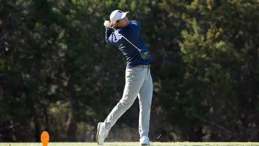 Joshua Hong tees off while playing for UTSA