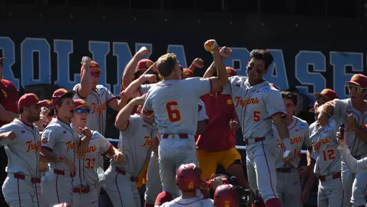 Dean Carpentier celebrates after a go-ahead grand slam.