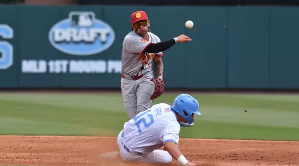 Abbrie Covarrubias throws it to first base to get the double play in the Super Regionals