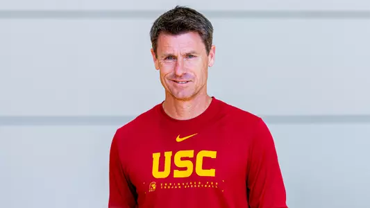 USC assistant coach Brad Davidson watches a summer practice