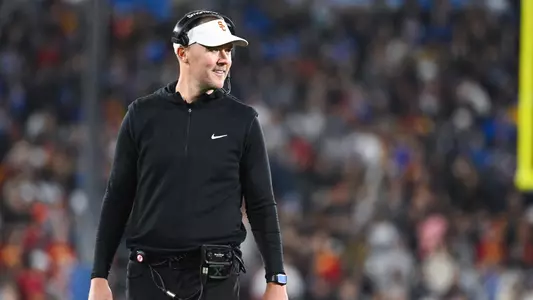 Lincoln Riley coaching in the Coliseum.