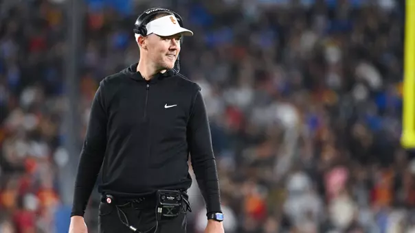 Lincoln Riley coaching in the Coliseum.