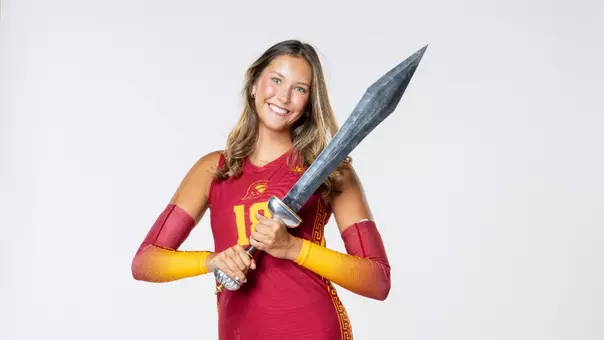 USC Women's Volleyball outside hitter Riley Malloy holds trojan sword during a media day photoshoot