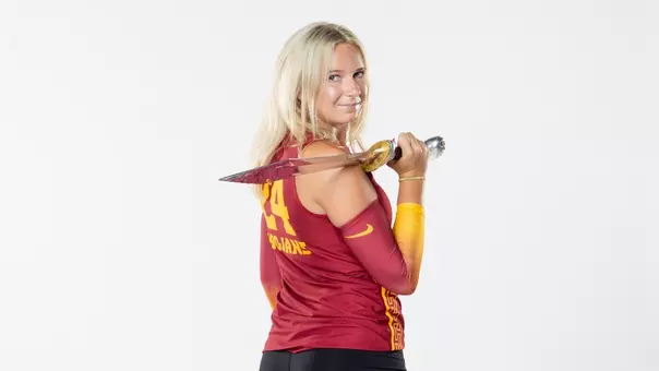 USC women's volleyball setter Milly McGee poses with the Trojan sword during media day