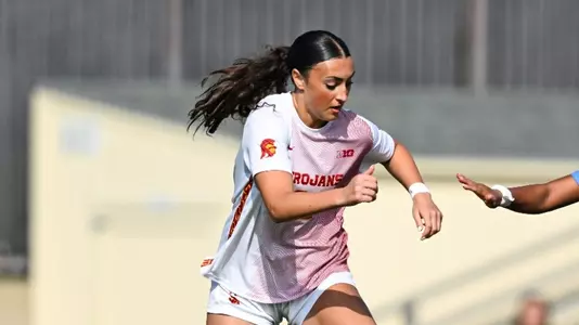 Edra Bello fights for the ball on the road against UCLA.