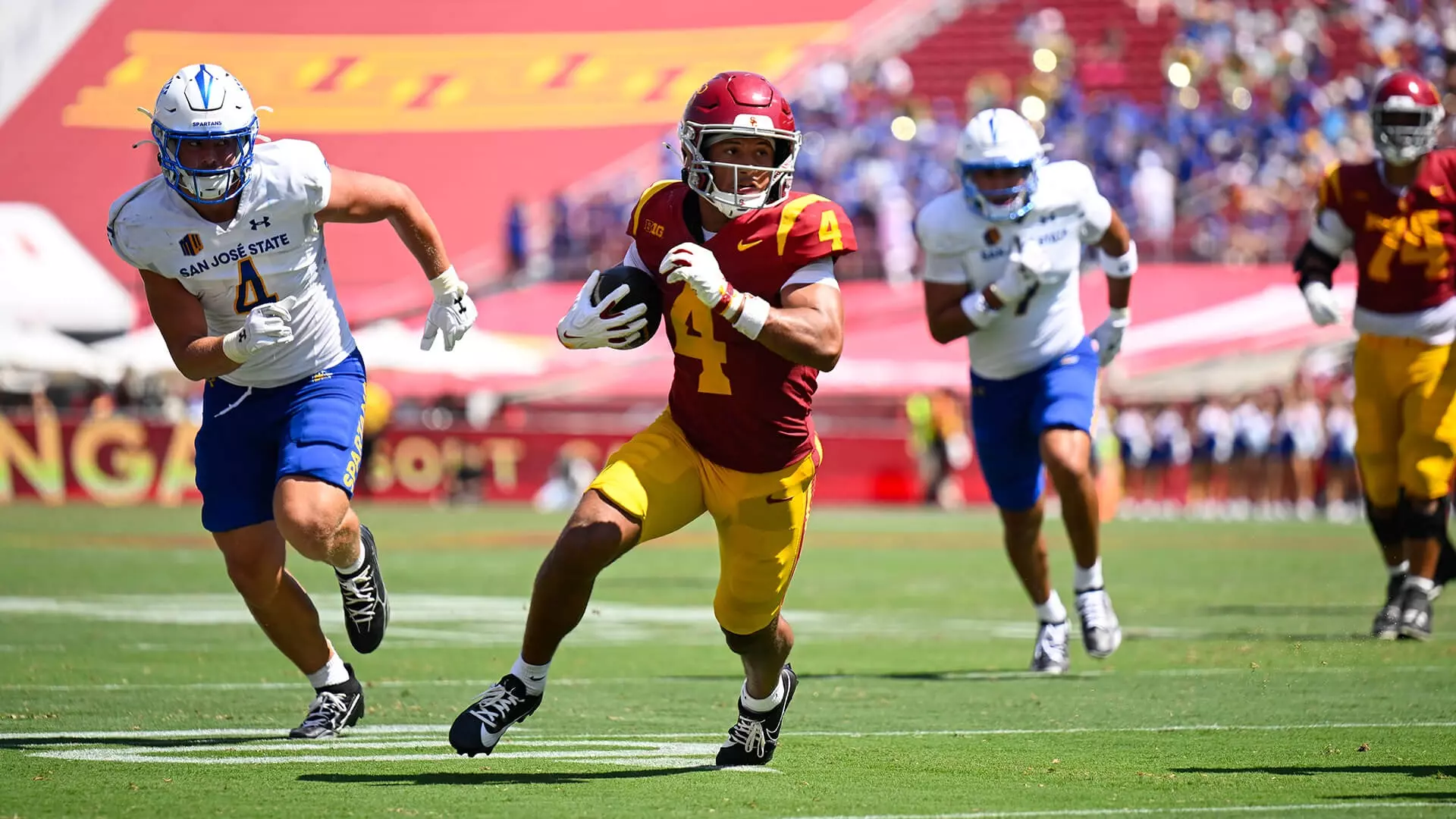 USC Trojans Football wide receiver Trent Mosley carries ball against San Jose State Spartans
