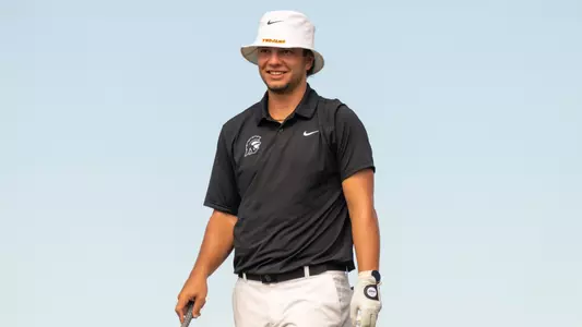 Deitrek Gill waits to tee off at the Bombs Darts Birds Collegiate