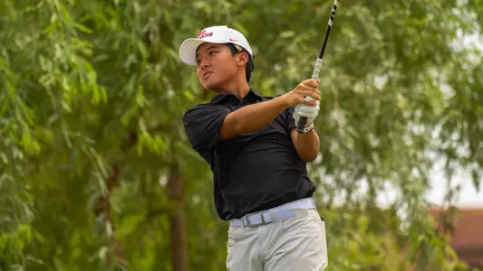 William Hou tees off at the Bombs Darts Birds Collegiate