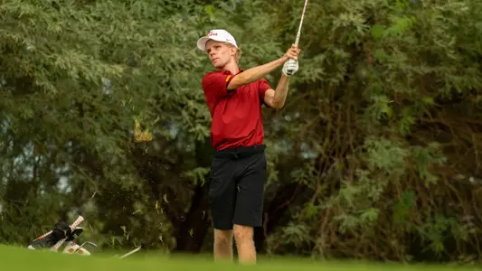 Hendrik-Luka Schmitz swings an iron at the Bombs Darts Birds Collegiate