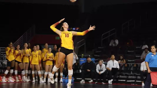 USC women's volleyball outside hitter Quinn Loper serves a ball during a match against Oregon State at Galen Center