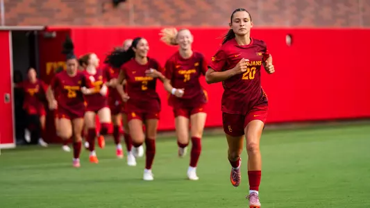 Ines Simas leads USC out of the tunnel before a game at Rawlinson Stadium.