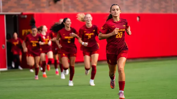 Ines Simas leads USC out of the tunnel before a game at Rawlinson Stadium.