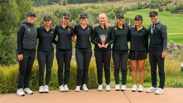 The USC women's golf team poses with the trophy at the 2026 Golfweek Red Sky Classic