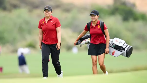 Assistant coach Beth Wu walks with Elise Lee at the NCAA Championships