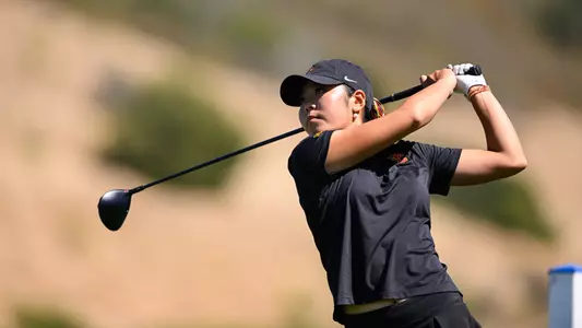 Jasmine Koo swings a driver during the 2026 NCAA Championships