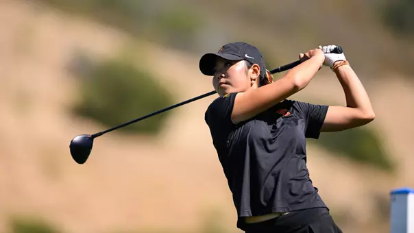 Jasmine Koo swings a driver during the 2026 NCAA Championships