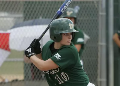 Softball Splits Games On Opening Day; Urbanik Blasts Two Key Home Runs