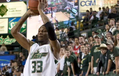 Mercer Drains 19 to Lead USF to 69-60 Victory over San Diego