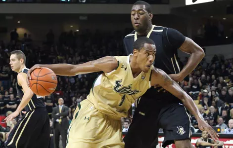 Bulls Show Backbone, Hold Off Vermont in Opener